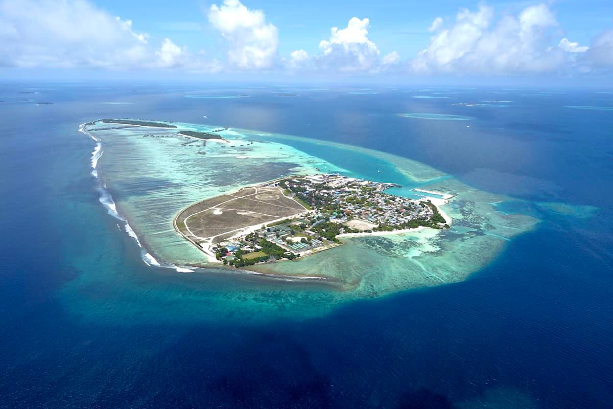 White sand beach and gentle waves, Kiribati